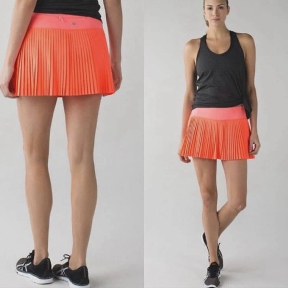 lululemon athletica Dresses & Skirts - Lululemon Pleat to Street Tennis Skirt/Skort Grapefruit Size 8